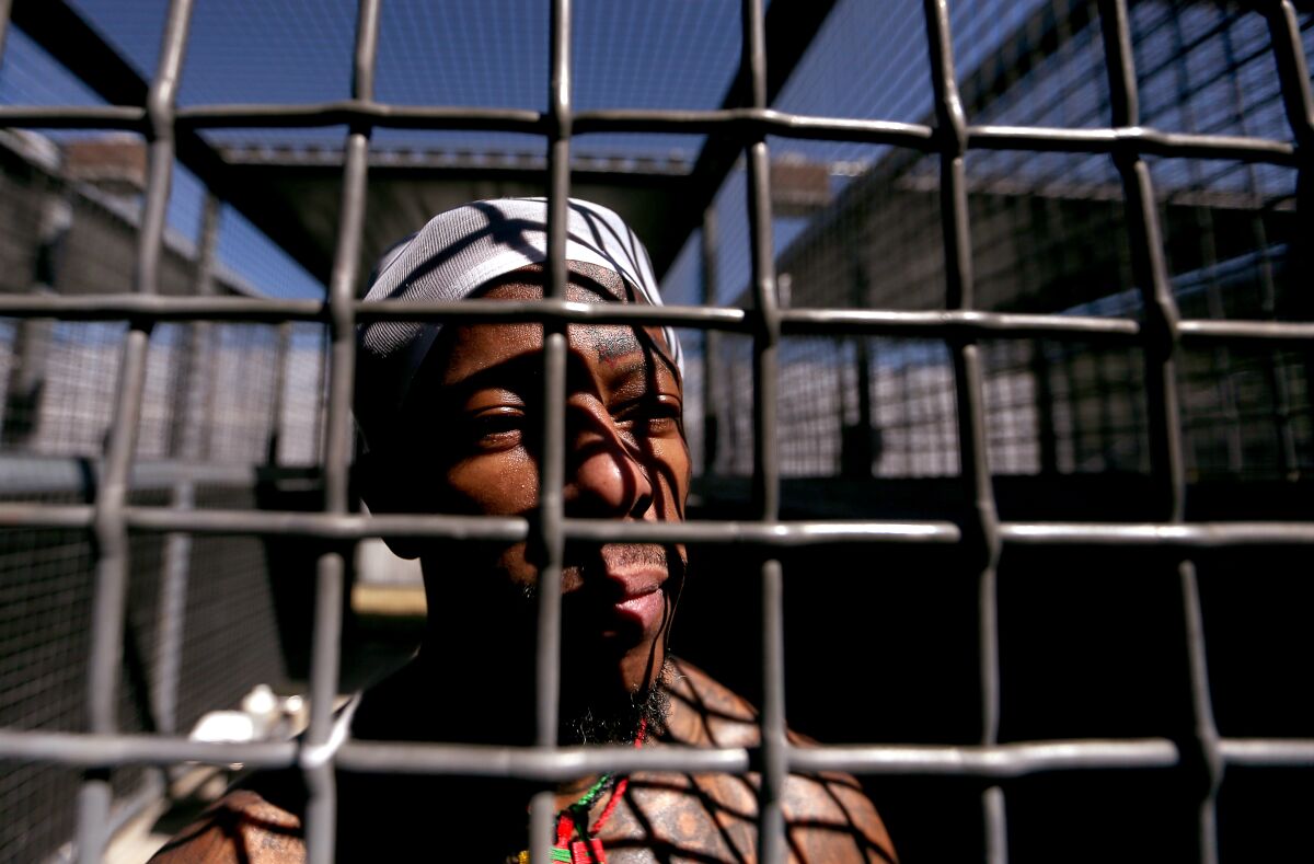 Maurice League is confined in an outdoor cage in the excercise yard at California State Prison, Sacramento.