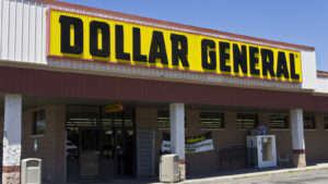Dollar General (DG) store front with yellow store sign, midday