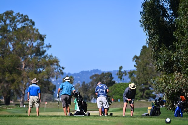 ALAMEDA, CALIFORNIA - OCTOBER 3: Golfers prepare to tee off on the 11th hole at Corica Park Golf Course in Alameda, Calif., on Monday, Oct. 3, 2022. (Jose Carlos Fajardo/Bay Area News Group)
