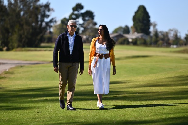 ALAMEDA, CALIFORNIA - OCTOBER 3: Corica Park Golf Course owners Umesh Patel and his wife Avani Patel walk along the golf course at Corica Park Golf Course in Alameda, Calif., on Monday, Oct. 3, 2022. (Jose Carlos Fajardo/Bay Area News Group)