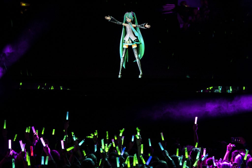 Japanese virtual singer Hatsune Miku performs on stage during a concert at the Zenith concerthall, in Paris, on January 16, 2020. (Photo by Christophe ARCHAMBAULT / AFP) (Photo by CHRISTOPHE ARCHAMBAULT/AFP via Getty Images)