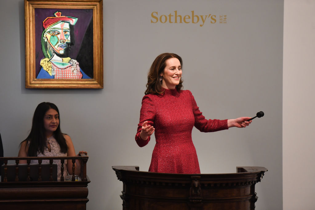 Sotheby's auctioneer Helena Newman sells Pablo Picasso's weeping Golden Muse at auction in 2018. Photo by Chris J Ratcliffe/Getty Images for Sotheby's.