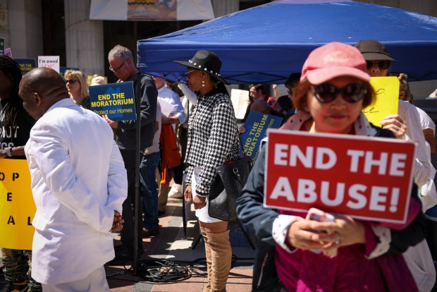 A group of landlords and members of the East Bay Rental Housing Association attend a press conference to end the eviction moratorium in front of the City Hall in Oakland, Calif., on Tuesday, April 11, 2023.(Ray Chavez/Bay Area News Group)