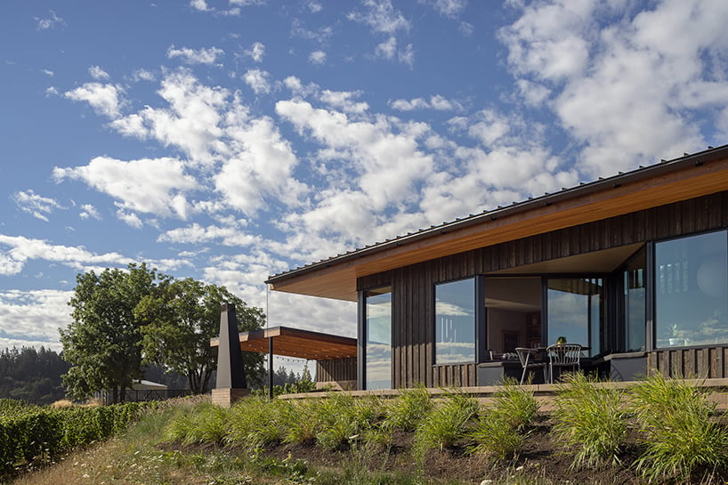 fragmented wooden residence by pbw architects traces the vineyard hills of portland