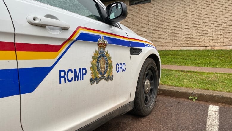 A police car with the RCMP logo.