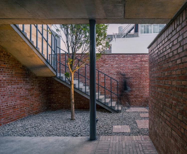 Village Collective Housing / No10-Architects - Exterior Photography, Stairs, Brick, Handrail