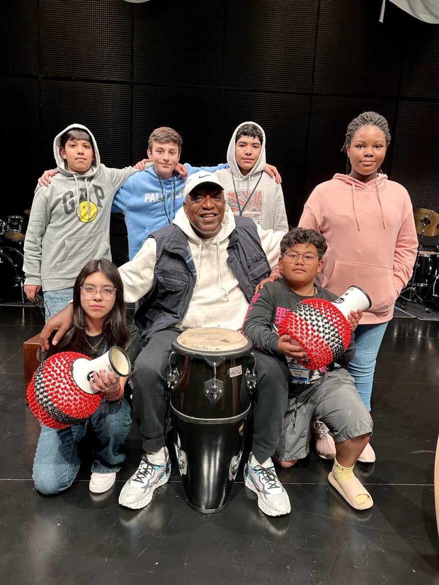 James Henry and the drum and percussion student, Raymond, Angel, Marco, Ruby, Andrew, Deliy’ah at the Boom theater