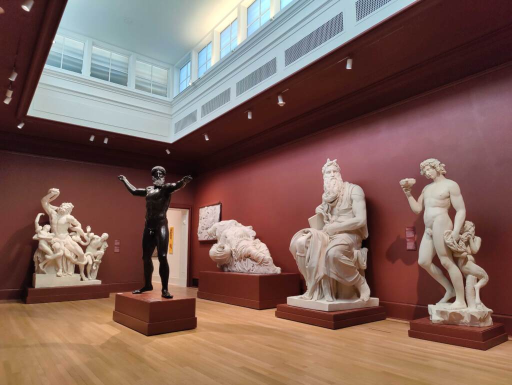 The red room is the Cast Room, with replicas of classic Grecian sculptures often used for study.