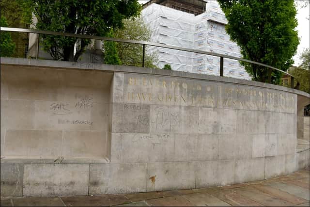 The monument's expensive Portland stone wall was defaced.