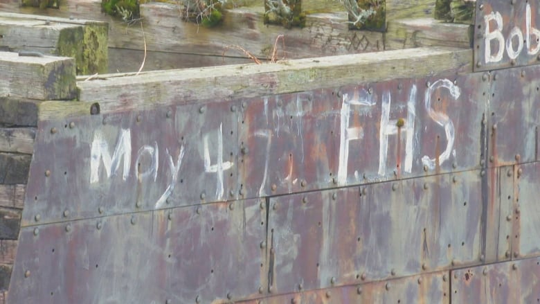 Graffiti on a structure in the St. John River.
