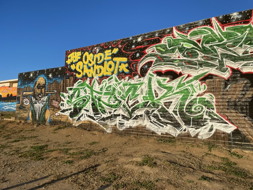 Pictured, a mural featuring graffiti art and a dog from the film 'The Sandlot' in Oceanside, Calif. April 16, 2024.