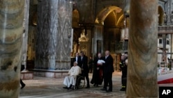 Pope Francis enters St. Mark's Basilica in Venice, Italy, April 28, 2024. The Pontiff arrived for his first-ever visit to the lagoon town including the Vatican pavilion at the 60th Biennal of Arts.
