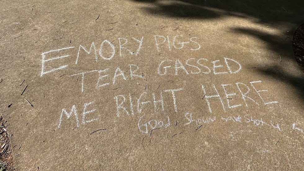 A chalk message written on a sidewalk on the Emory campus, Sunday, April 28, 2024.