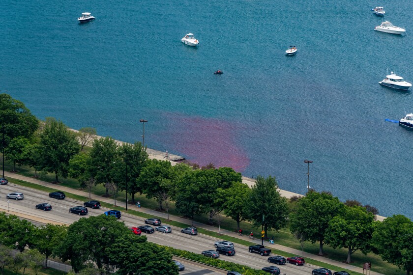 Red dye is released into Lake Michigan