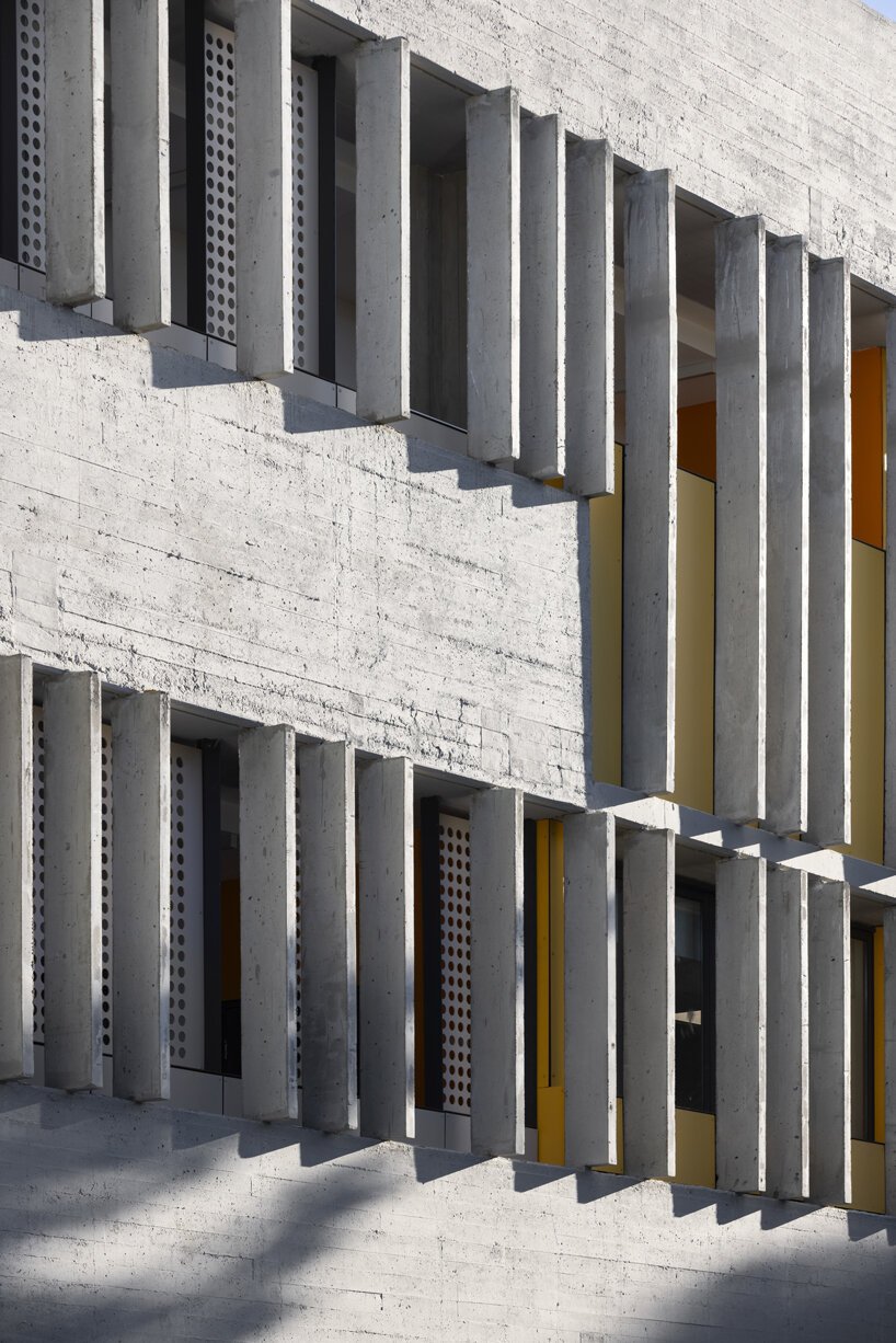 pops of color breathe new life into 1960s abandoned brutalist building